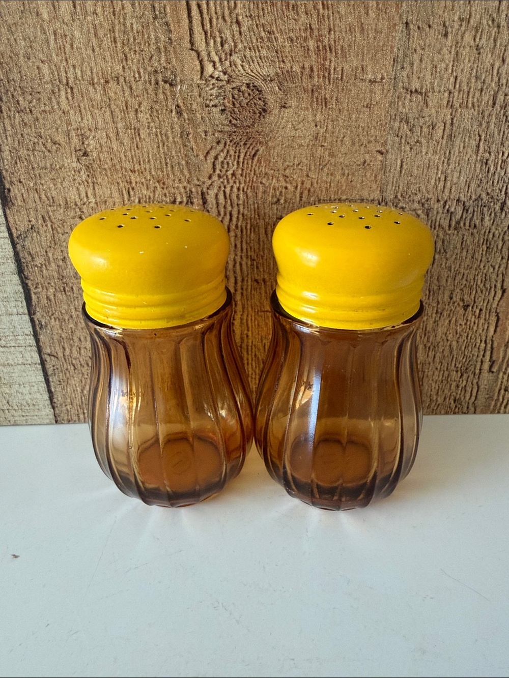 Vintage Otto Amber Glass Ribbed Salt and Pepper Shakers with Yellow Lids